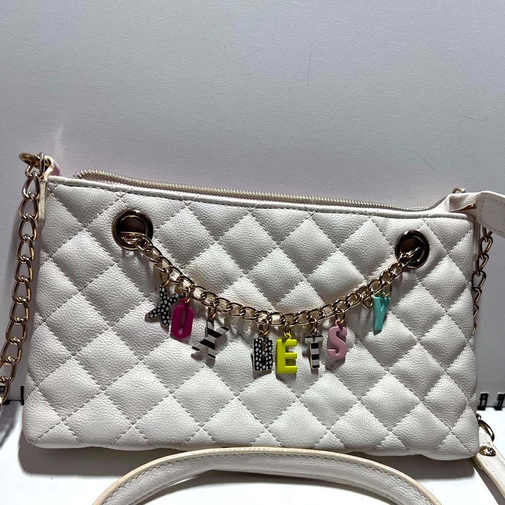 Betsey Johnson cream quilted charm crossbody bag